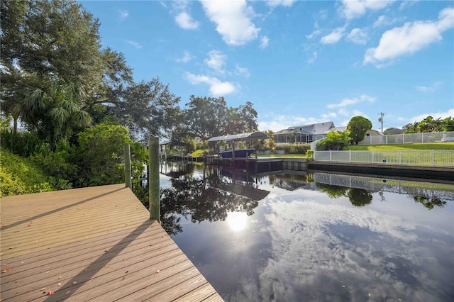 4532 Shark Dr, Bradenton, FL 34208 - dock area featuring a water view and fence