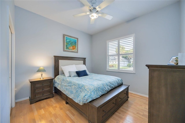 4532 Shark Dr, Bradenton, FL 34208 - bedroom featuring baseboards, light wood-style flooring, and ceiling fan
