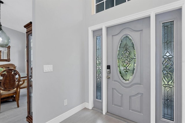 foyer with light hardwood / wood-style floors and plenty of natural light