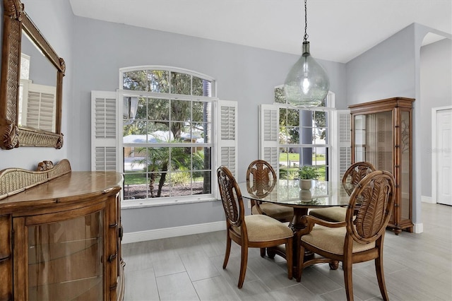 dining space featuring plenty of natural light