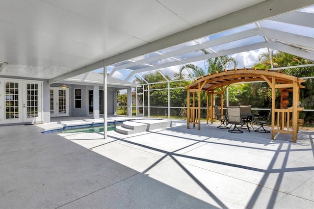 exterior space with french doors and glass enclosure