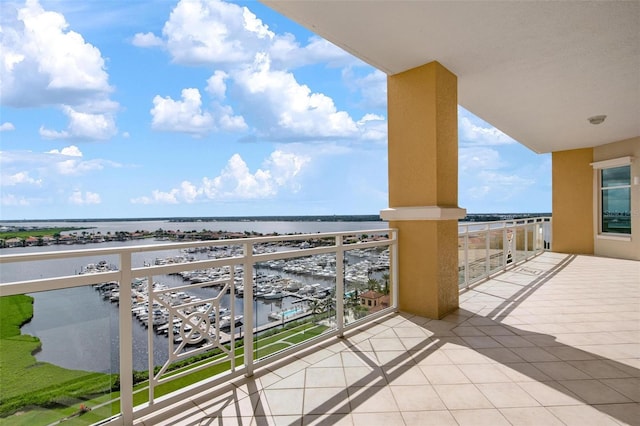 balcony featuring a water view