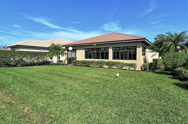 exterior space featuring a front yard