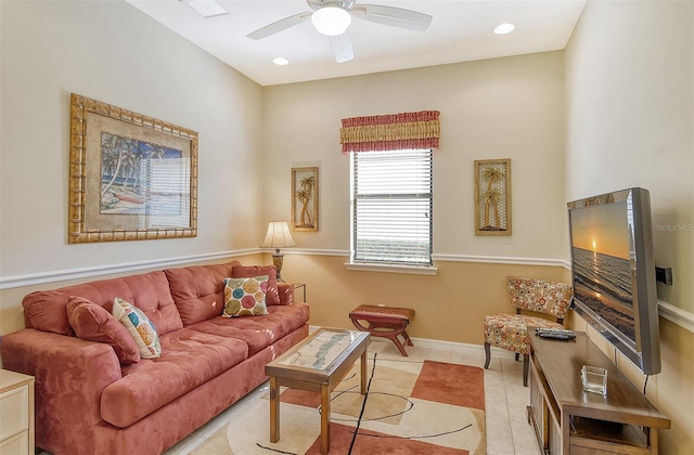 tiled living room featuring ceiling fan