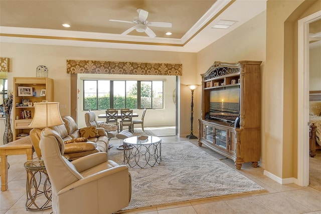 living room featuring baseboards, visible vents, a raised ceiling, a ceiling fan, and recessed lighting