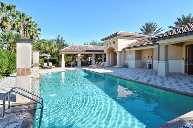 pool featuring a patio