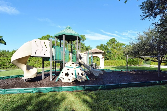 view of playground with a yard