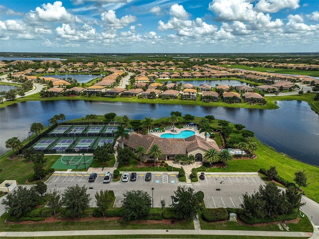 bird's eye view with a water view