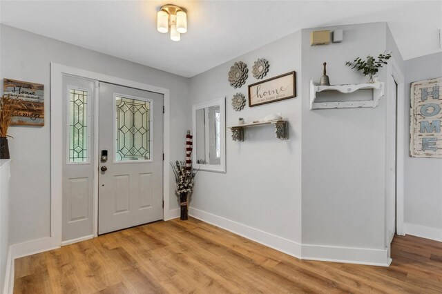 entrance foyer with light wood-type flooring