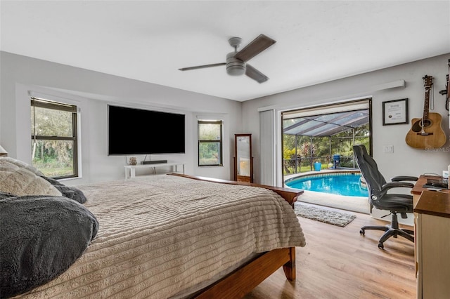 bedroom with access to exterior, ceiling fan, and light hardwood / wood-style floors