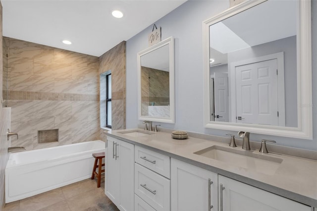 bathroom with tile patterned flooring, shower with separate bathtub, and vanity