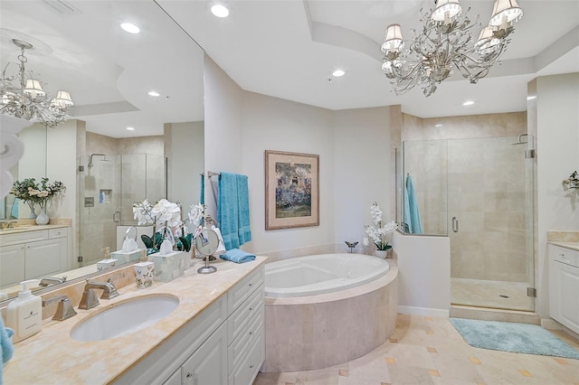 bathroom with independent shower and bath, vanity, tile patterned flooring, and a notable chandelier