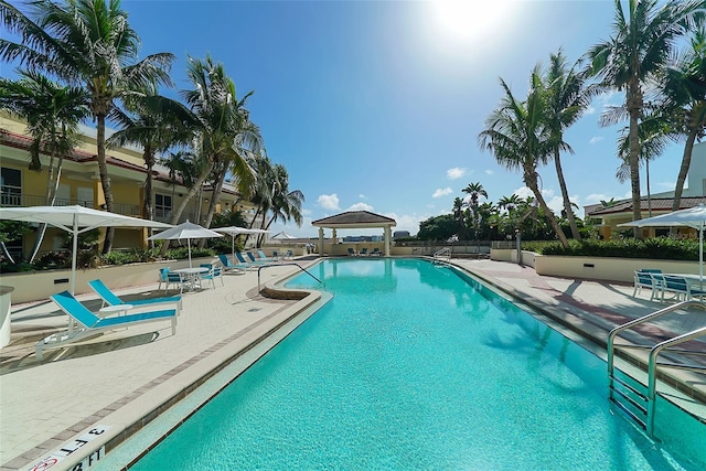 view of pool featuring a gazebo and a patio