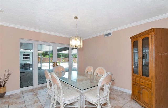 dining area with ornamental molding, french doors, visible vents, and baseboards