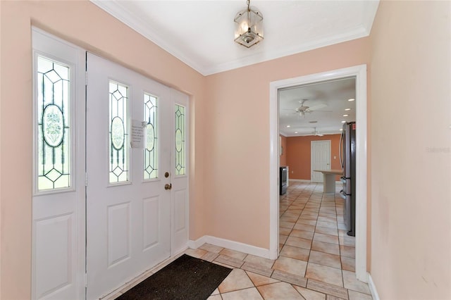 entrance foyer featuring light tile patterned floors, baseboards, crown molding, and recessed lighting