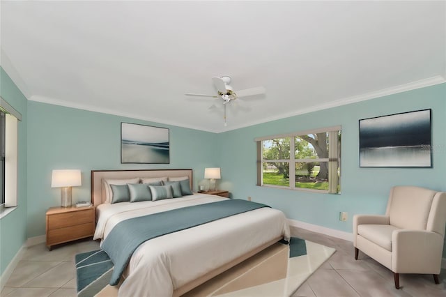 bedroom with a ceiling fan, light tile patterned flooring, crown molding, and baseboards