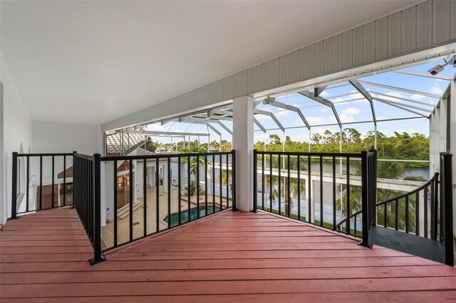 wooden deck with a water view