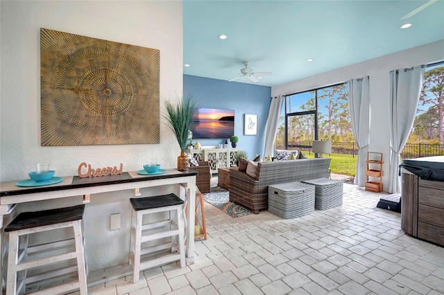 interior space with plenty of natural light and ceiling fan