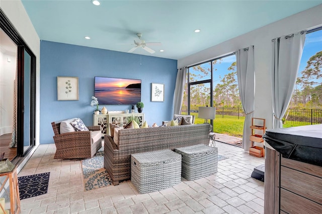 living room featuring ceiling fan