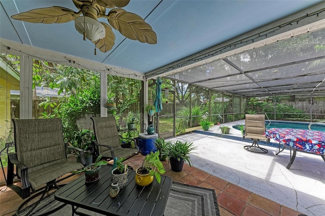 view of patio with a fenced backyard, a lanai, and an outdoor pool