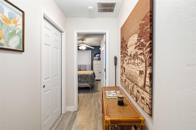 hall featuring light hardwood / wood-style flooring