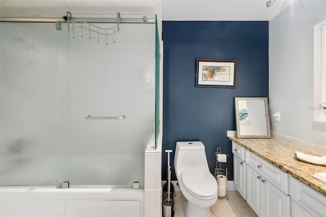 bathroom with vanity, toilet, and walk in shower