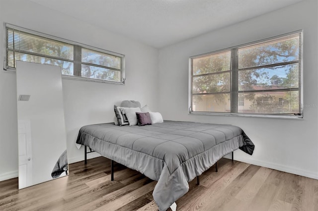 bedroom featuring light hardwood / wood-style flooring