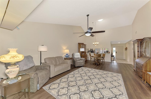 living room featuring high vaulted ceiling, wood-type flooring, and ceiling fan