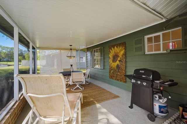 sunroom with plenty of natural light