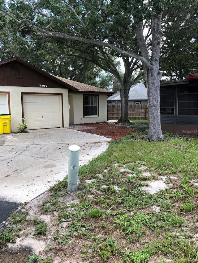 exterior space with a garage