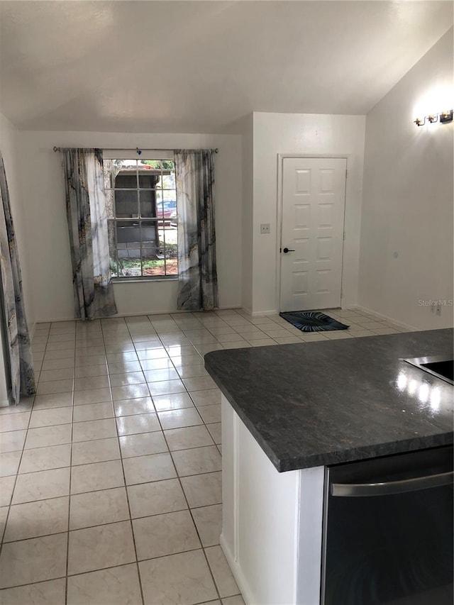 kitchen with light tile patterned floors