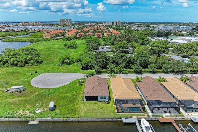 bird's eye view with a water view