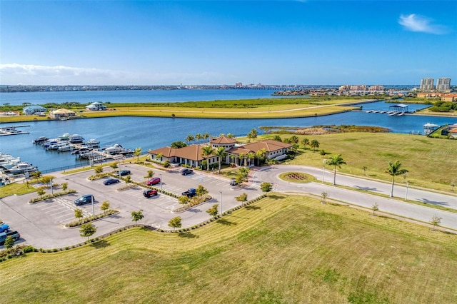 birds eye view of property featuring a water view