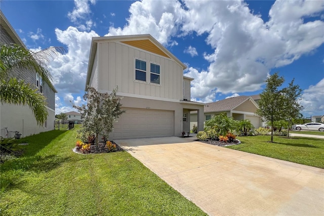 view of front of home featuring a garage and a front lawn