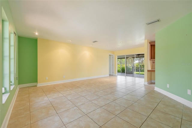13460 Marquette Blvd, Fort Myers, FL 33905 - unfurnished room featuring light tile patterned floors, baseboards, and visible vents