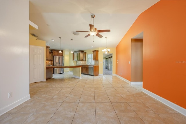 13460 Marquette Blvd, Fort Myers, FL 33905 - unfurnished living room with light tile patterned floors, ceiling fan with notable chandelier, a sink, visible vents, and baseboards