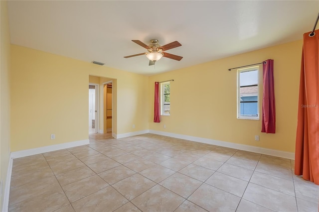 13460 Marquette Blvd, Fort Myers, FL 33905 - empty room with baseboards, a wealth of natural light, visible vents, and a ceiling fan