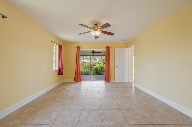 13460 Marquette Blvd, Fort Myers, FL 33905 - unfurnished room with light tile patterned floors, visible vents, baseboards, and a ceiling fan