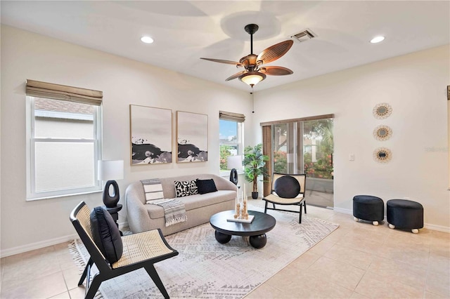 sitting room featuring a ceiling fan, recessed lighting, visible vents, and light tile patterned flooring