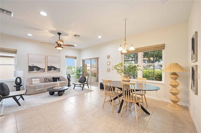 dining space featuring light tile patterned flooring, visible vents, and recessed lighting