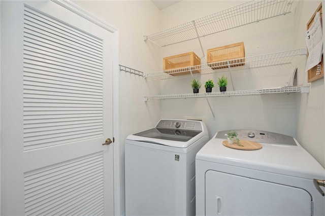 laundry room featuring laundry area and washer and dryer