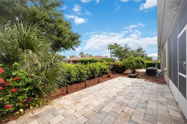 view of patio with central AC unit