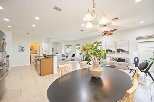 dining room with light tile patterned floors, visible vents, and recessed lighting