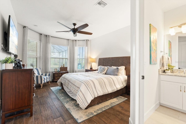 bedroom with ceiling fan and light hardwood / wood-style floors