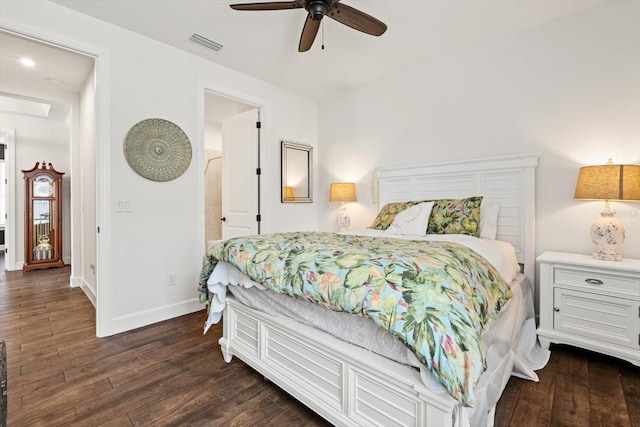 bedroom featuring ceiling fan and dark hardwood / wood-style floors