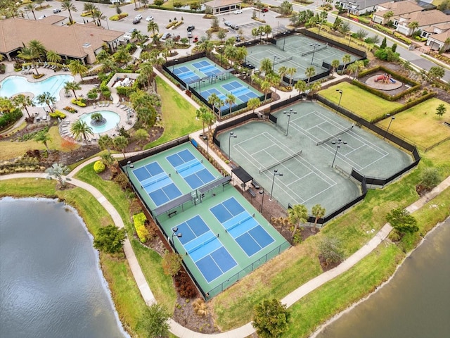 birds eye view of property featuring a water view