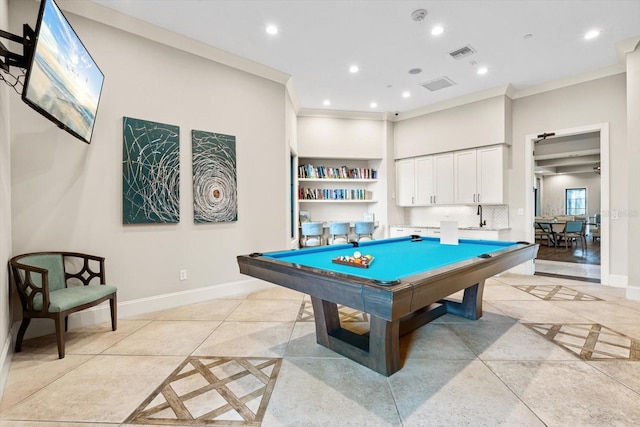 recreation room featuring crown molding, sink, pool table, and light tile patterned flooring