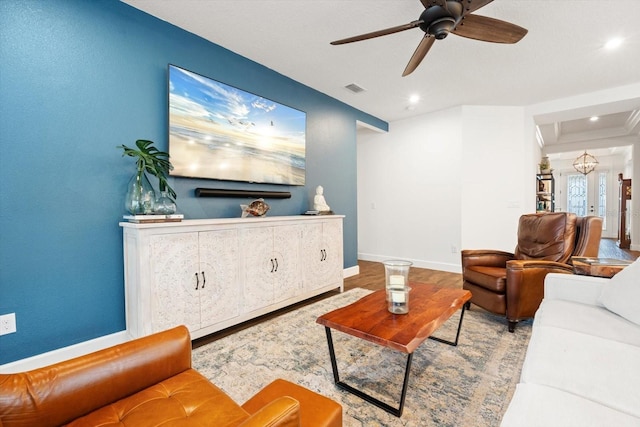 living room featuring french doors, ceiling fan, and hardwood / wood-style floors