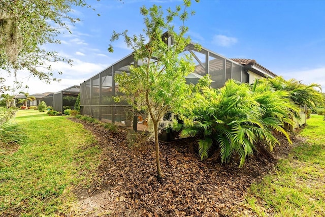 view of yard featuring a lanai