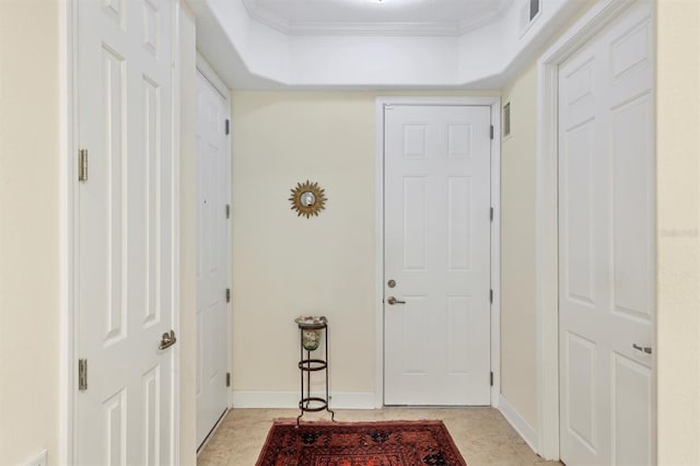 entrance foyer featuring ornamental molding